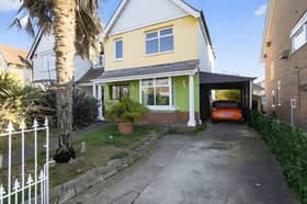 Set behind gates on Orchard Road, this detached Havant property is on the market for £550,000