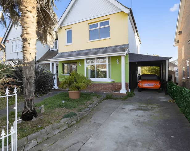 Set behind gates on Orchard Road, this detached Havant property is on the market for £550,000