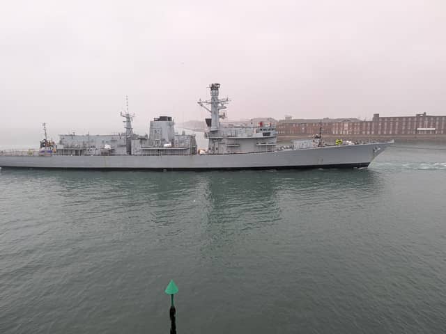 Retired Type 23 frigate HMS Iron Duke being towed to HMNB Portsmouth ahead of the prospect of being scrapped.