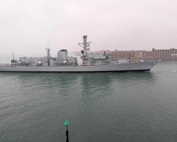 Retired Type 23 frigate HMS Iron Duke being towed to HMNB Portsmouth ahead of the prospect of being scrapped.