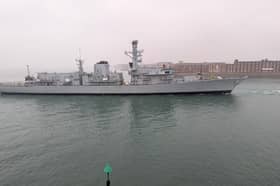 Retired Type 23 frigate HMS Iron Duke being towed to HMNB Portsmouth ahead of the prospect of being scrapped.
