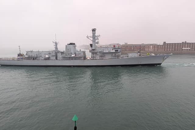 Retired Type 23 frigate HMS Iron Duke being towed to HMNB Portsmouth ahead of the prospect of being scrapped.