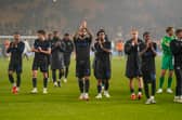 Marlon Pack and Pompey's players applaud he travelling support following Tuesday night's 1-1 draw at Molineux. Picture: Jason Brown