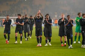 Marlon Pack and Pompey's players applaud he travelling support following Tuesday night's 1-1 draw at Molineux. Picture: Jason Brown