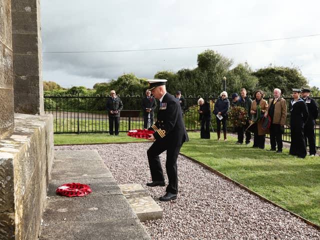 Cdr Steve May of HMS Collingwood lays a wreath at the Nelson monument. Service to commemorate Trafalgar Day and the life of Admiral Lord Nelson.