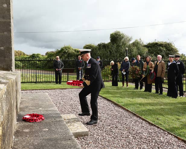 Cdr Steve May of HMS Collingwood lays a wreath at the Nelson monument. Service to commemorate Trafalgar Day and the life of Admiral Lord Nelson.