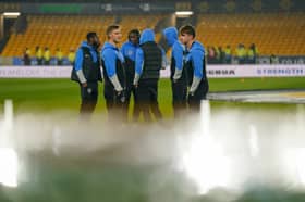 Thomas Waddingham and his Pompey team-mates at Wolves on Tuesday night. Pic: Jason Brown