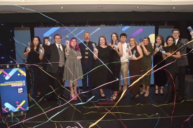 Pictured is: (fifth from left) Compere Mark Collins with all the winners.
Picture: Sarah Standing 