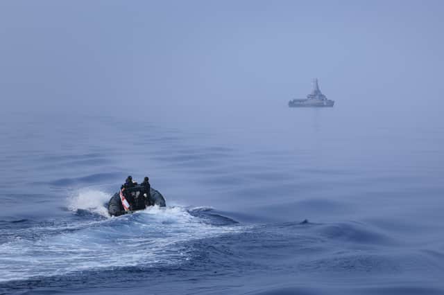 PAC 24 Rigid inflatable sea boat transits towards Singapore ship RSS Dauntless to conduct a transfer of people between ships to share skills and see how other nations operate when conducting manoeuvres at sea.