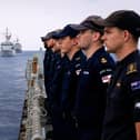 Royal Navy sailors have been conducting war games in the South China Sea despite previously threats from Beijing. Pictured: Royal Navy and Royal New Zealand sailors stand to attention on HMS Tamar’s flight deck.