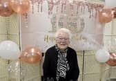 Eileen Gordon from Cowplain, celebrated her 100th birthday on Sunday, October 18, 2026.  At a surprise birthday party on October 23, thrown by Age Concern, the Mayor of Havant Paul Tansom presented Eileen with a bouquet of flowers.

Picture: Sarah Standing (231026-1337)
