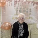 Eileen Gordon from Cowplain, celebrated her 100th birthday on Sunday, October 18, 2026.  At a surprise birthday party on October 23, thrown by Age Concern, the Mayor of Havant Paul Tansom presented Eileen with a bouquet of flowers.

Picture: Sarah Standing (231026-1337)