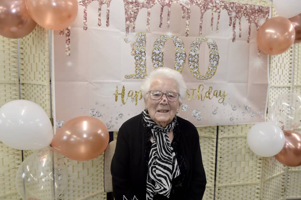 Eileen Gordon from Cowplain, celebrated her 100th birthday on Sunday, October 18, 2026.  At a surprise birthday party on October 23, thrown by Age Concern, the Mayor of Havant Paul Tansom presented Eileen with a bouquet of flowers.

Picture: Sarah Standing (231026-1337)