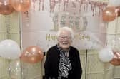 Eileen Gordon from Cowplain, celebrated her 100th birthday on Sunday, October 18, 2026.  At a surprise birthday party on October 23, thrown by Age Concern, the Mayor of Havant Paul Tansom presented Eileen with a bouquet of flowers.

Picture: Sarah Standing (231026-1337)