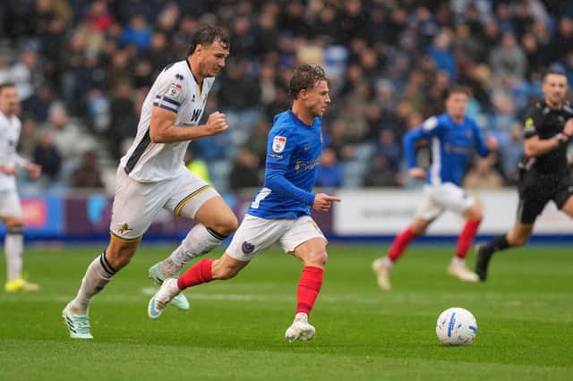 Adrian Segecic is delighted for his Pompey team-mate after scoring a late Pompey winner. Picture: Jason Brown