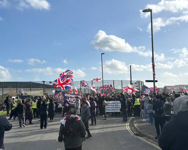 Anti-immigration protestors marching in Gosport following recent migrant boat landings.