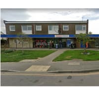 Man remains at large after robbing Tesco store and telling staff he had gun
