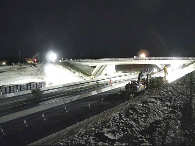 Footage reveals round-the-clock operation to demolish bridge as M3 Junction 9 improvement project gathers pace