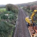 Workers planting a signal post with a piling rig as part of the rail upgrade near Petersfield Railway Station 
Picture: Habibur Rahman