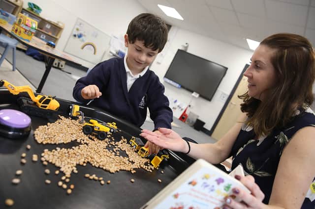 Niko Hadjigeorgiou, aged 5, with his mum Sarah Hadjigeorgiou, in The Quay at St George’s CofE Primary School, Portsea