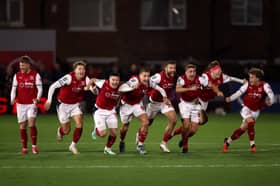 Former Pompey midfielder Andy Cannon and his Fleetwood team-mates celebrate victory over Arsenal. Pic: Getty