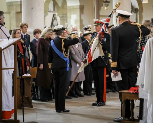 Princess Anne visited Portsmouth Cathedral for the Laying Up of the Queen's Colours on October 29, 2026.. This honoured the late Queen Elizabeth II.  Pictured: Handing over of the Queen's colours by First Sea Lord Sir Gwyn Jenkins to HRH Princess Royal