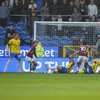Portsmouth unbeaten run continues with hard-earned Burnley draw
