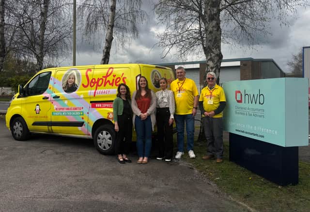 FAMILY SUPPORT. From left: HWB colleagues Emma Kemp, Marketing Executive, Susan Wooding, Tax Compliance Manager and Liz Torkington, Office Administrator, with volunteers from Sophie’s Legacy Dennis Dawes and John Miller.