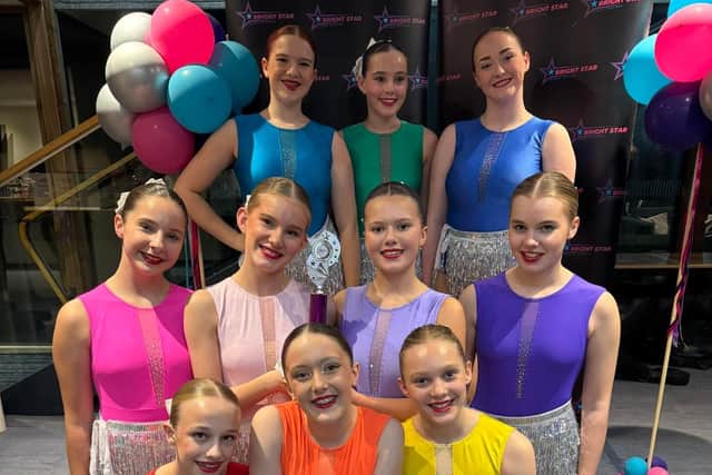 The dancers are fundraising to support their trip
