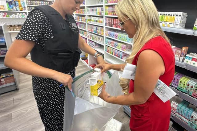 Amanda Martin MP out with Trading Standard seizing counterfeit goods in Portsmouth 