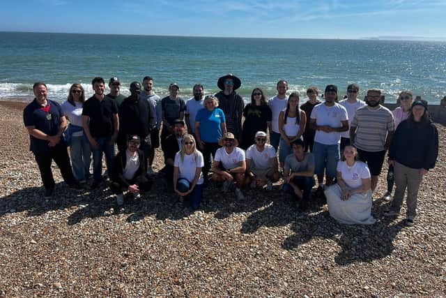 The boxChilli team on Eastoke Beach with Cllr Mark Coates and Helen from Final Straw Foundation, after helping clear litter from the shoreline on a sunny Hayling Island clean‑up.