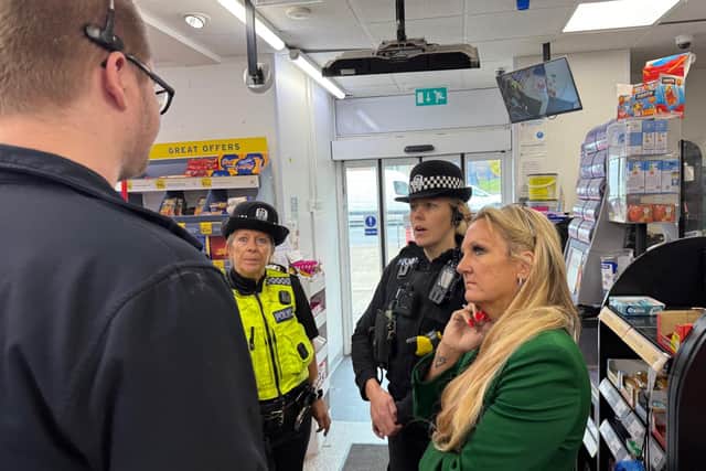 Amanda Martin visiting local retailers with Portsmouth Police