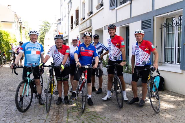 Alan Mak MP (centre) with fellow riders on the leg between Evreux and Paris during the 40th Hayling Cycle Ride