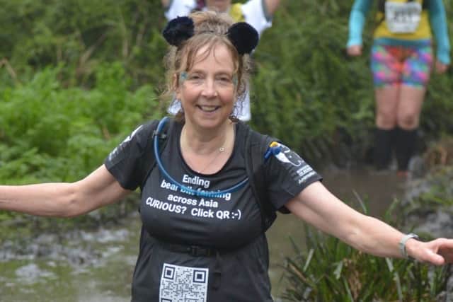 Hampshire’s Janie Allen taking part in the grueling 20-mile Grizzly mud and hills race organised by Axe Valley Runners. Janie recently took part in a research trial into hereditary angioedema