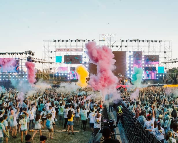people gathering on green grass field during the daytime