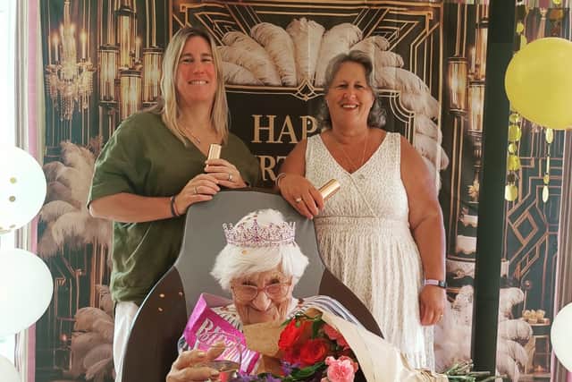 Morna celebrating with family.
