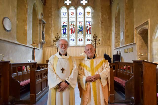 Former Archbishop Rowan Williams and Canon Terry Louden in St Michael and All Angels Church, Chalton