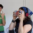 Film students trying out early VR set