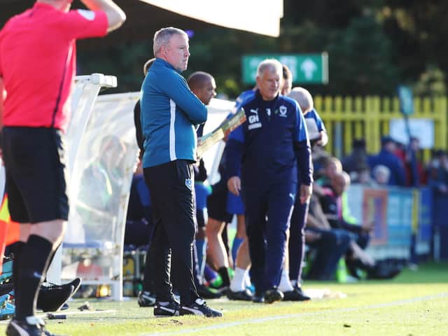 Kenny Jackett watches the action at Kingsmeadow / Picture: Joe Pepler