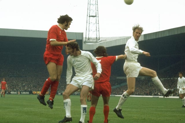 Liverpool's Larry Lloyd (left) and Kevin Keegan compete with Leeds United's Jack Charlton (right) and Paul Madeley during a Football League Division One match at Anfield on September 30, 1972. Picture by Allsport UK/Allsport.