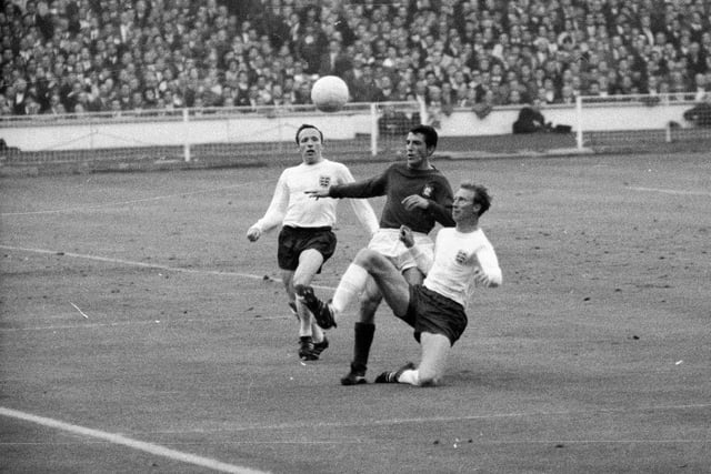 Charlton and Nobby Stiles against Portugal in the 1966 World Cup semi-final at Wembley. Photo by Norman Quicke/Express/Getty Images.