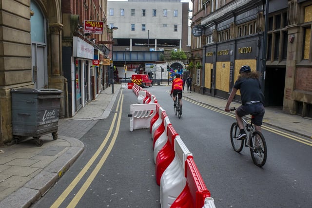 Extra barriers have been put in place in the city centre to create safer socially distant pavements and cycle lanes of four metres width