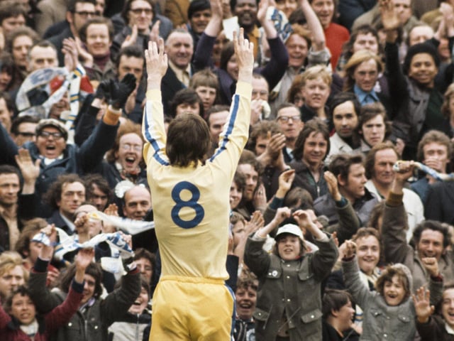 Allan 'Sniffer' Clarke applauds the Leeds United fans.