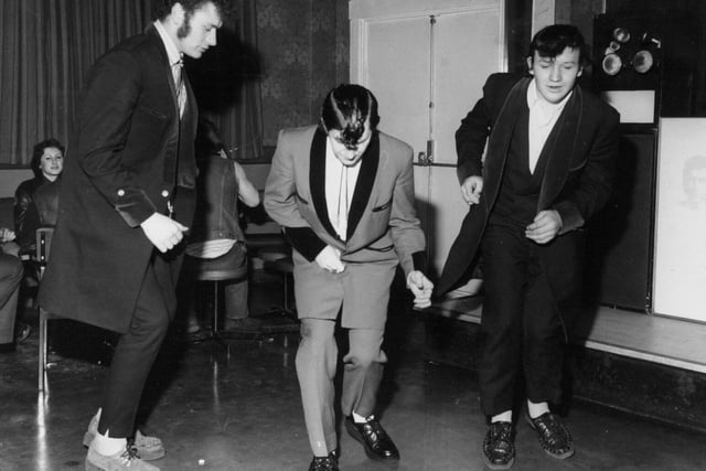 Teddy boys bopping on the dance floor at the Wykebeck Arms. Pictured from left, Dennis Peace, Martin Gibbs and Laddy Whitaker.
