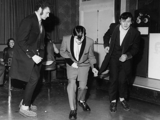 Teddy boys bopping on the dance floor at the Wykebeck Arms. Pictured from left, Dennis Peace, Martin Gibbs and Laddy Whitaker.