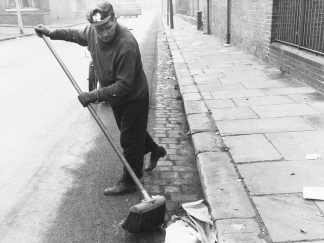 Street cleaner Harry Farrar hard at work in Holbeck.