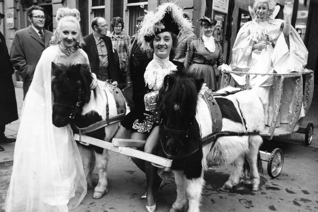 Cinderalla's coach arrives at Leeds City Varieties on The Headrow ready for the pantomime.