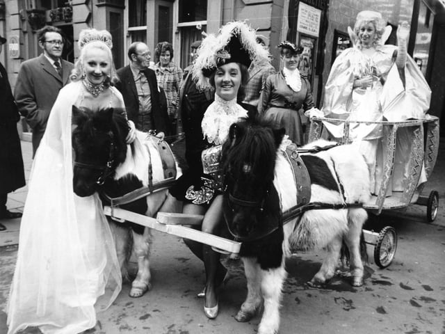 Cinderalla's coach arrives at Leeds City Varieties on The Headrow ready for the pantomime.
