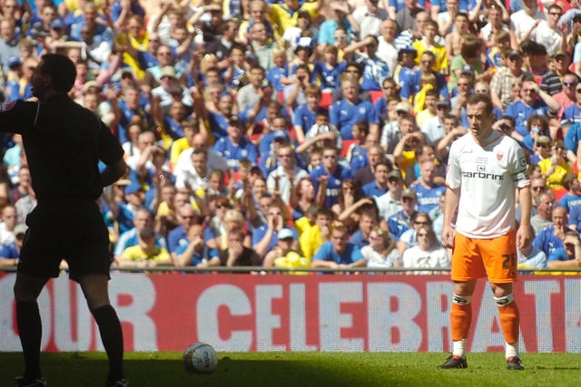 Charlie Adam lines up a free-kick that would see Blackpool equalise early on