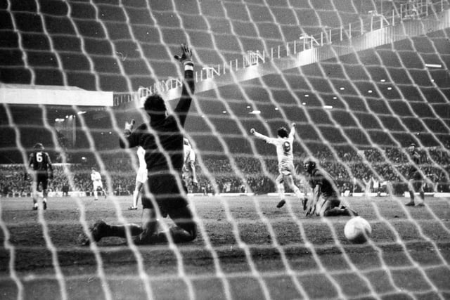 Allan Clarke scores United's second goal against Barcelona in the first leg of the European Cup semi-final at Elland Road.